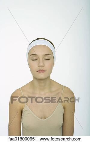 Teenage girl wearing headband, eyes closed View Large Photo Image Stock Image - Teenage girl wearing headband, eyes closed. Fotosearch