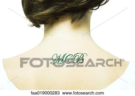 Teenage girl with initial's tattooed onto upper back, close-up View Large Photo Image Stock Image - Teenage girl with initial's tattooed onto upper back, close-up. Fotosearch