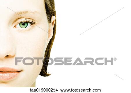 Picture - Teenage girl's face, extreme close-up. Fotosearch