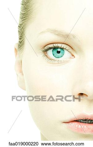 Stock Image - Teenage girl's face, extreme close-up. Fotosearch