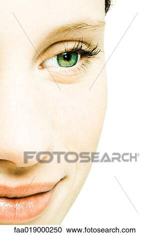 Stock Image - Teenage girl's face, extreme close-up. Fotosearch