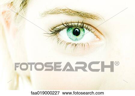 Stock Photo - Teenage girl's face, extreme close-up. Fotosearch