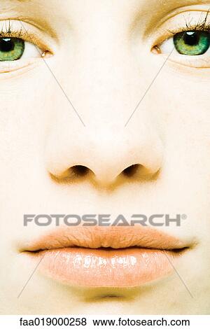 Stock Photo - Teenage girl's face, extreme close-up. Fotosearch