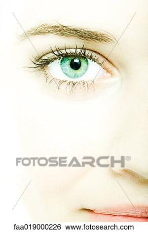 Stock Photograph - Teenage girl's face, extreme close-up. Fotosearch