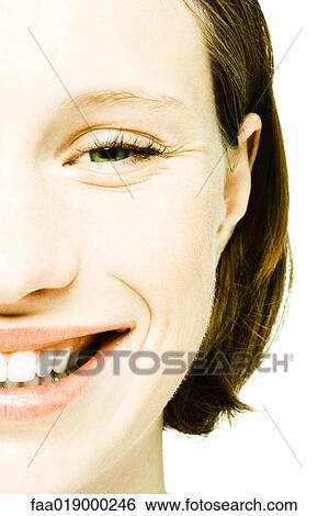 Stock Photograph - Teenage girl's face, extreme close-up. Fotosearch