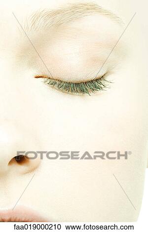 Teenage girl's face, eye closed, extreme close-up View Large Photo Image Stock Image - Teenage girl's face, eye closed, extreme close-up. Fotosearch