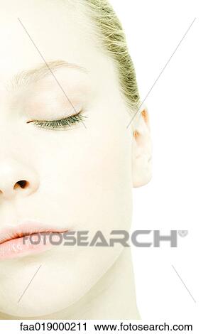 Teenage girl's face, eye closed, extreme close-up View Large Photo Image Stock Image - Teenage girl's face, eye closed, extreme close-up. Fotosearch