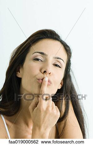 Woman blowing kiss, portrait View Large Photo Image Stock Image - Woman blowing kiss, portrait. Fotosearch
