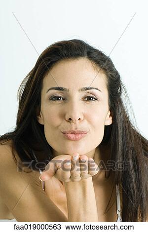 Woman blowing kiss, portrait View Large Photo Image Stock Image - Woman blowing kiss, portrait. Fotosearch