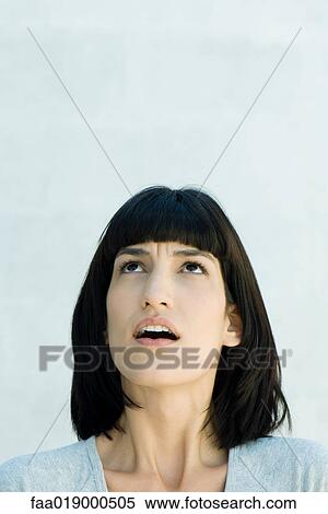 Woman, looking up, portrait View Large Photo Image Stock Photography - Woman, looking up, portrait. Fotosearch