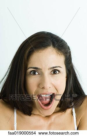 Woman making surprised face, portrait View Large Photo Image Picture - Woman making surprised face, portrait. Fotosearch