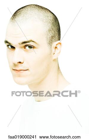 Young man looking at camera, head and shoulders, portrait View Large Photo Image Stock Image - Young man looking at camera, head and shoulders, portrait. Fotosearch