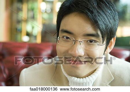 Stock Photograph - Young man, portrait. Fotosearch