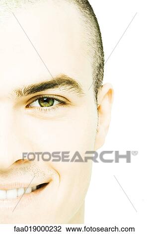 Young man smiling at camera, close-up View Large Photo Image Stock Image - Young man smiling at camera, close-up. Fotosearch