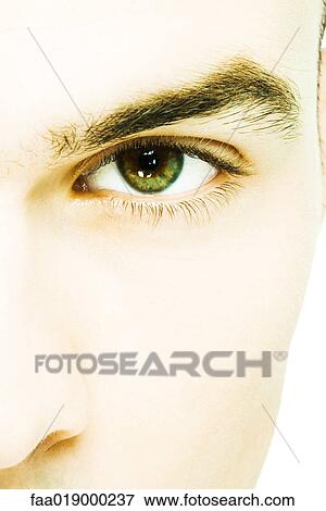 Young man's eye, extreme close-up View Large Photo Image Stock Photo - Young man's eye, extreme close-up. Fotosearch