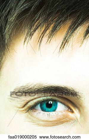 Young man's eye, extreme close-up View Large Photo Image Stock Photography - Young man's eye, extreme close-up. Fotosearch