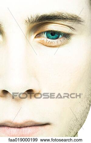 Stock Photo - Young man's face, extreme close-up. Fotosearch