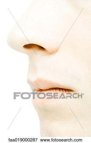 Stock Photo - Young man's face, extreme close-up. Fotosearch