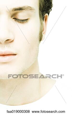 Young man's face, extreme close-up View Large Photo Image Stock Photo - Young man's face, extreme close-up. Fotosearch