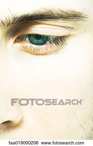 Stock Photograph - Young man's face, extreme close-up. Fotosearch
