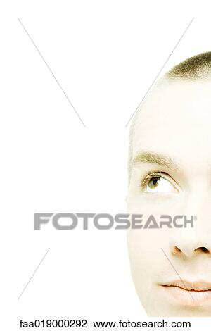 Young man's face, looking up, extreme close-up View Large Photo Image Stock Image - Young man's face, looking up, extreme close-up. Fotosearch
