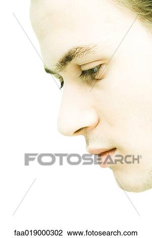 Young man's face, profile, extreme close-up View Large Photo Image Stock Image - Young man's face, profile, extreme close-up. Fotosearch