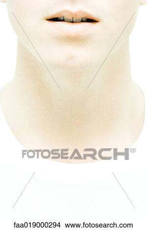 Young man's lower face and neck, close-up View Large Photo Image Picture - Young man's lower face and neck, close-up. Fotosearch