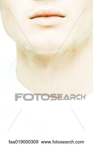 Stock Photo - Young man's lower face, extreme close-up. Fotosearch