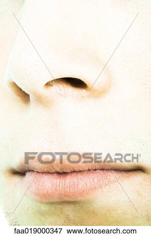Young man's nose and mouth, extreme close-up View Large Photo Image Stock Photo - Young man's nose and mouth, extreme close-up. Fotosearch