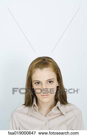Young woman, looking at camera, portrait View Large Photo Image Stock Photo - Young woman, looking at camera, portrait. Fotosearch
