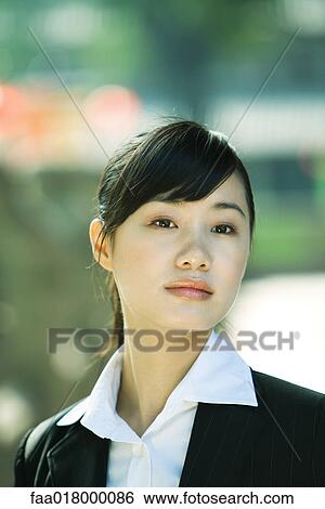 Young woman, portrait View Large Photo Image Stock Photograph - Young woman, portrait. Fotosearch