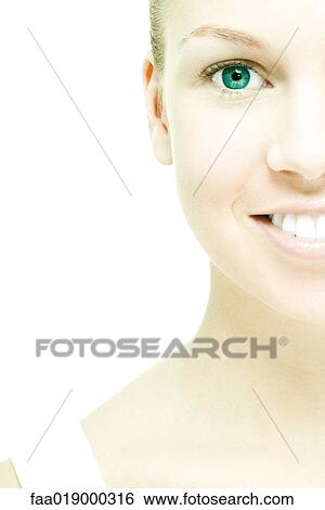 Young woman smiling at camera View Large Photo Image Stock Photograph - Young woman smiling at camera. Fotosearch