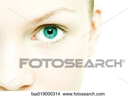 Picture - Young woman's face, extreme close-up. Fotosearch