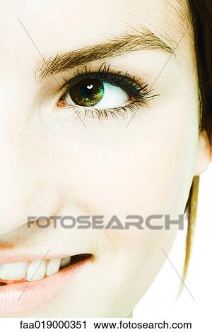Young woman's face, extreme close-up View Large Photo Image Stock Image - Young woman's face, extreme close-up. Fotosearch