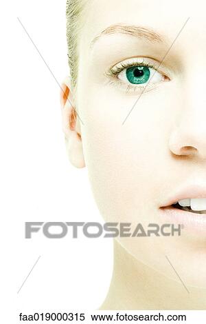 Stock Photography - Young woman's face, extreme close-up. Fotosearch
