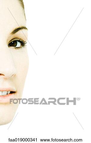 Young woman's face, partial view View Large Photo Image Stock Image - Young woman's face, partial view. Fotosearch