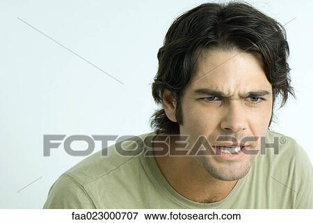 Angry man, looking away, portrait View Large Photo Image Stock Photo - Angry man, looking away, portrait. Fotosearch