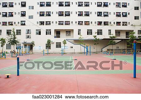 Apartment building complex with fitness court, China View Large Photo Image Picture - Apartment building complex with fitness court, China. Fotosearch