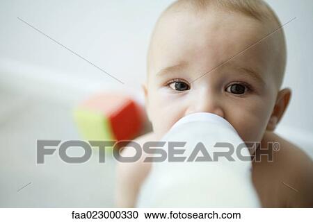 Baby drinking from bottle, personal perspective View Large Photo Image Stock Image - Baby drinking from bottle, personal perspective. Fotosearch