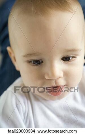 Baby with mouth open, close-up, headshot View Large Photo Image Picture - Baby with mouth open, close-up, headshot. Fotosearch