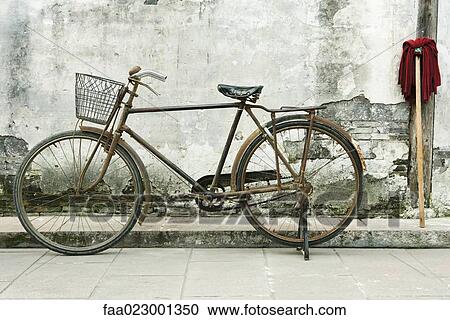 Bicycle and mop View Large Photo Image Stock Image - Bicycle and mop. Fotosearch