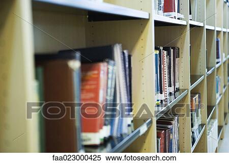 Bookshelves in library View Large Photo Image Stock Photography - Bookshelves in library. Fotosearch
