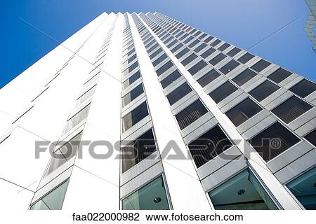 Stock Image - Building exterior, high rise, low angle view. Fotosearch