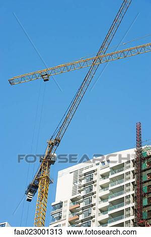 China, Guangdong Province, Guangzhou, high rise under construction View Large Photo Image Stock Image - China, Guangdong Province, Guangzhou, high rise under construction. Fotosearch