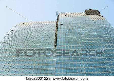 China, Guangdong Province, Guangzhou, office building under construction, low angle view View Large Photo Image Stock Photo - China, Guangdong Province, Guangzhou, office building under construction, low angle view. Fotosearch