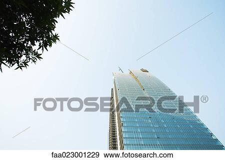 China, Guangdong Province, Guangzhou, office building under construction, low angle view View Large Photo Image Stock Photo - China, Guangdong Province, Guangzhou, office building under construction, low angle view. Fotosearch