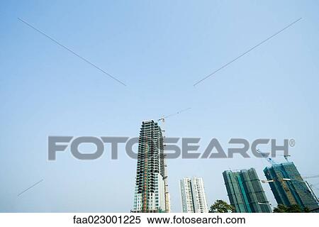 China, Guangdong Province, Guangzhou, high rises and cranes View Large Photo Image Stock Photography - China, Guangdong Province, Guangzhou, high rises and cranes. Fotosearch