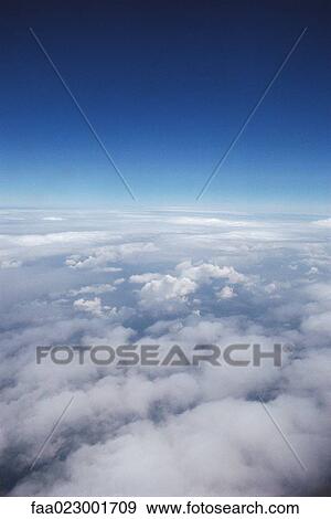 Stock Photo - Clouds, high angle view. Fotosearch