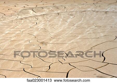 Cracked dry soil, full frame View Large Photo Image Stock Image - Cracked dry soil, full frame. Fotosearch