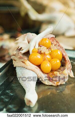 Cross section of hen with organs on scale in market, close-up View Large Photo Image Stock Image - Cross section of hen with organs on scale in market, close-up. Fotosearch